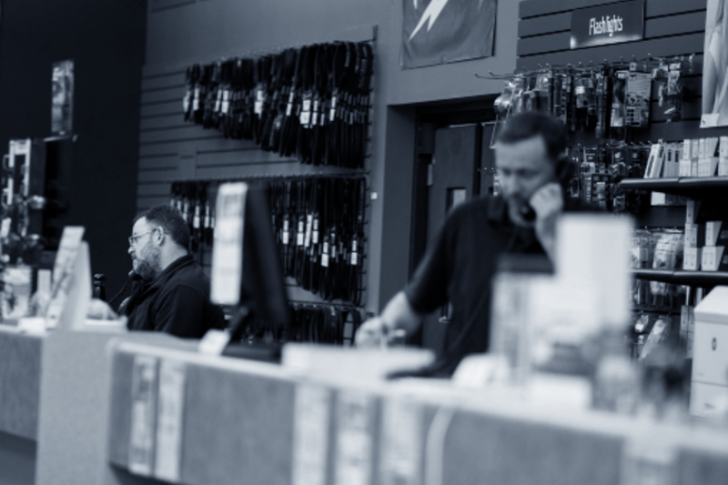 rsl sales associates on the phone at counter