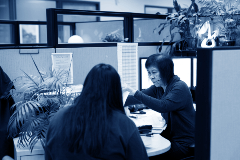 rsl employee at desk with coworker